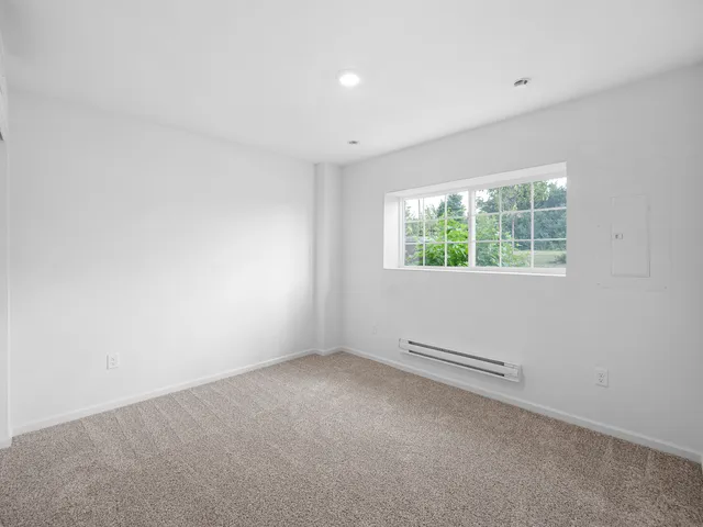 an empty room with windows