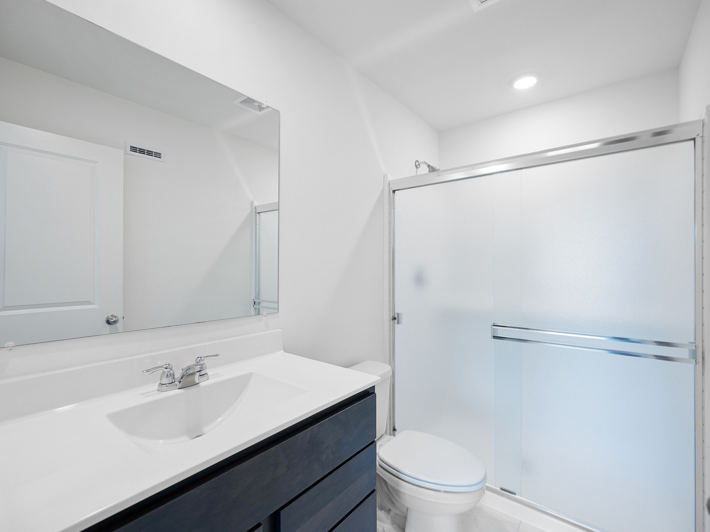 1533 Yosemite Way Pingree Grove, IL 60140 - Photo 9 of 17 a bathroom with a sink toilet and shower