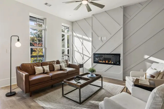 a living room with furniture and a window