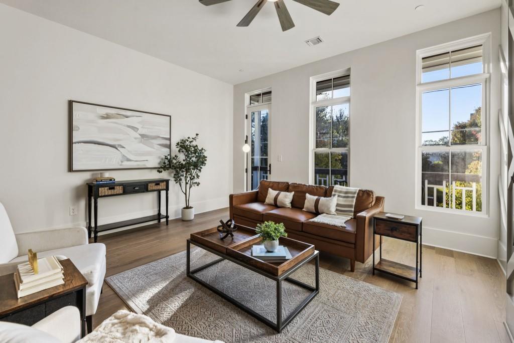 12455 Broadwell Road, Unit 202 Milton, GA 30004 - Photo 20 of 31 a living room with furniture and a window