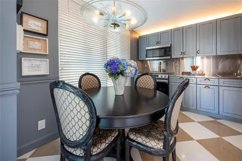 a bed room with bed and a book shelf