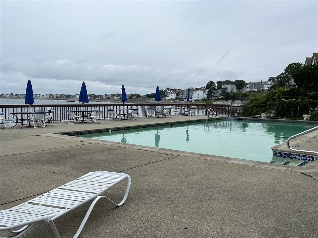 1 Pond Street, Unit 3B Winthrop, MA 02152 - Photo 11 of 11 a view of a lake with houses