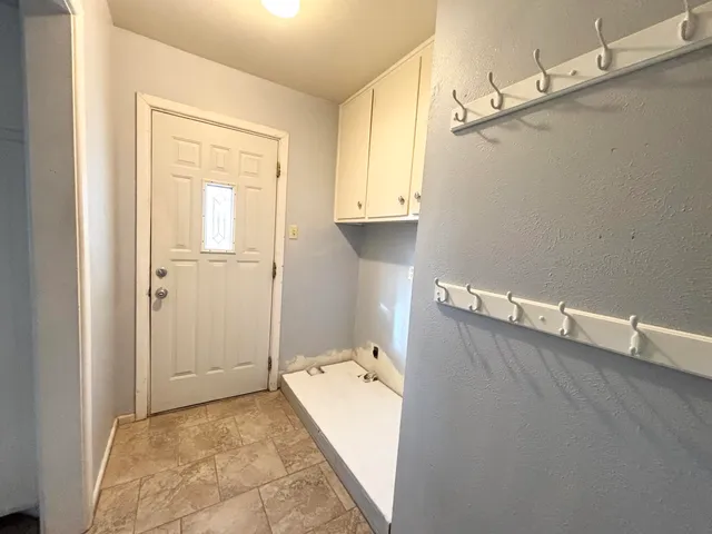 a view of a bathroom with tub