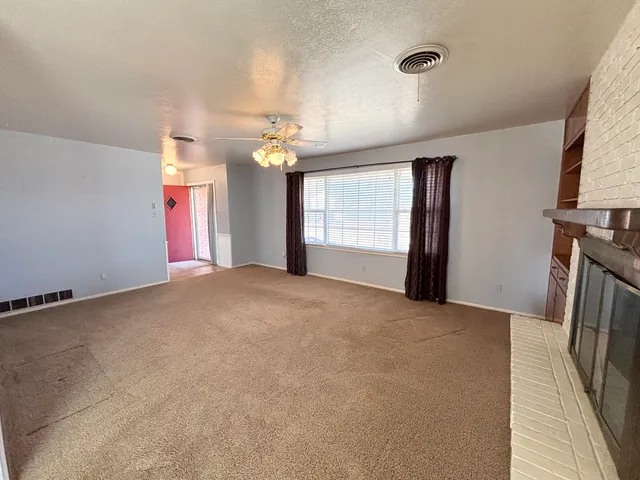 a view of a livingroom with a staircase