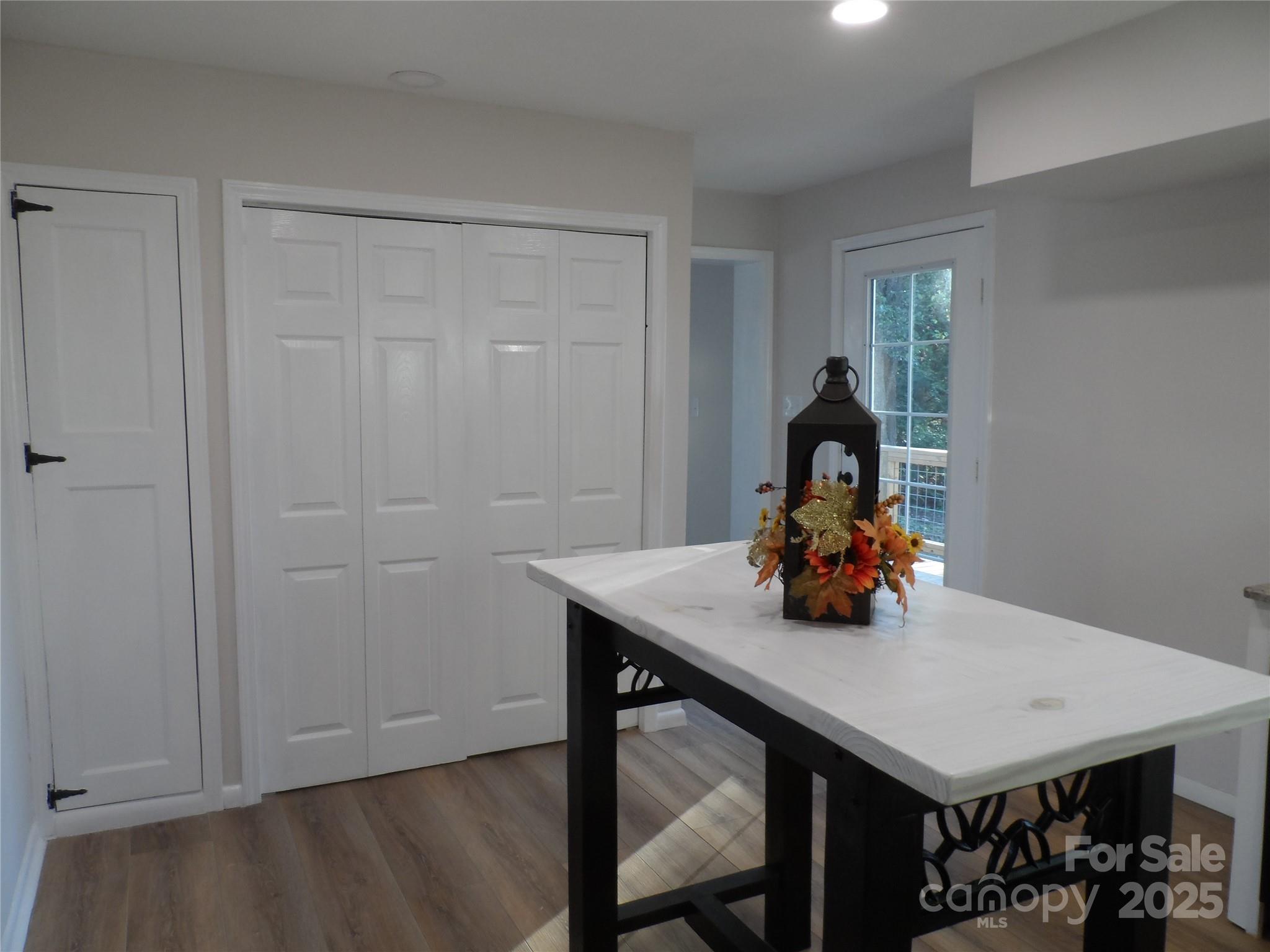 205 Phillips Street Morganton, NC 28655 - Photo 7 of 22 a view of a workspace with furniture and wooden floor