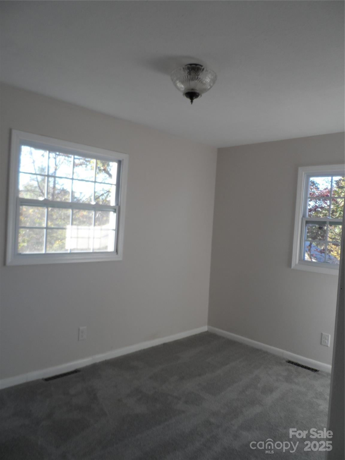205 Phillips Street Morganton, NC 28655 - Photo 9 of 22 an empty room with a window