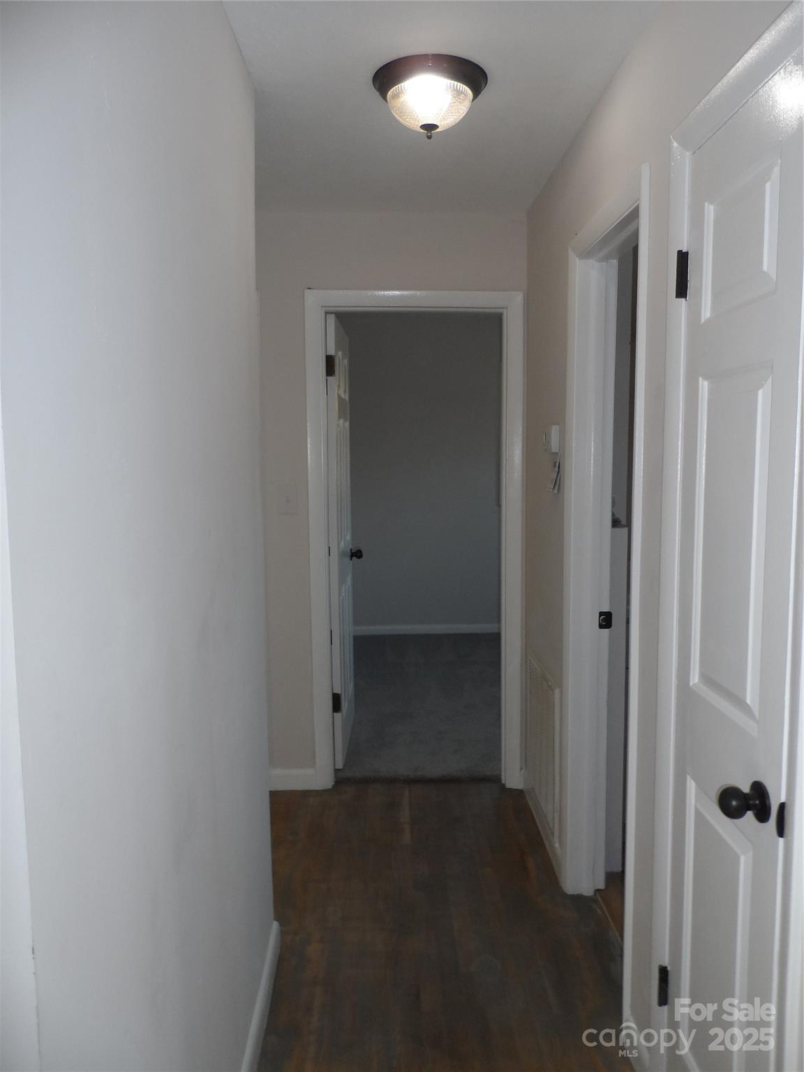 205 Phillips Street Morganton, NC 28655 - Photo 10 of 22 wooden floor in an empty room