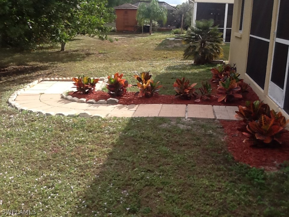 17217 Oriole Road Fort Myers, FL 33967 - Photo 19 of 22 a view of a backyard of the house