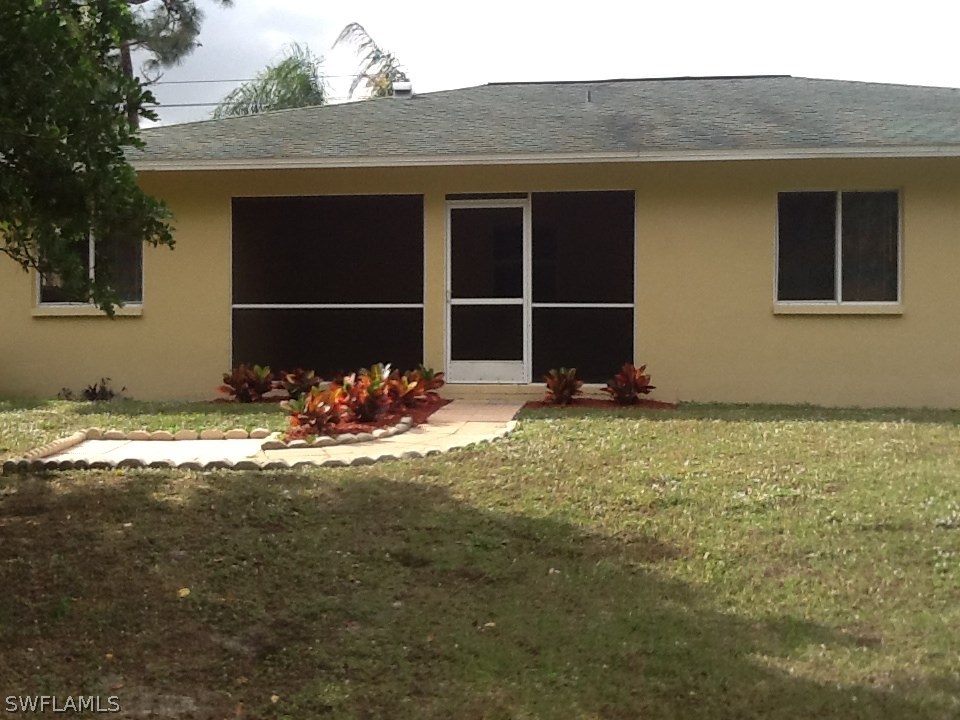 17217 Oriole Road Fort Myers, FL 33967 - Photo 2 of 22 a front view of a house