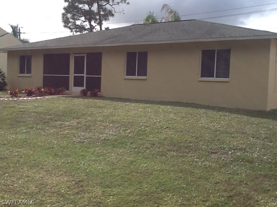 17217 Oriole Road Fort Myers, FL 33967 - Photo 21 of 22 a view of a backyard