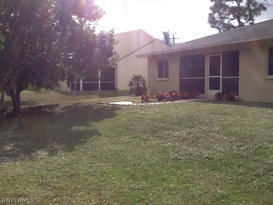 17217 Oriole Road Fort Myers, FL 33967 - Photo 22 of 22 a view of a house with a yard