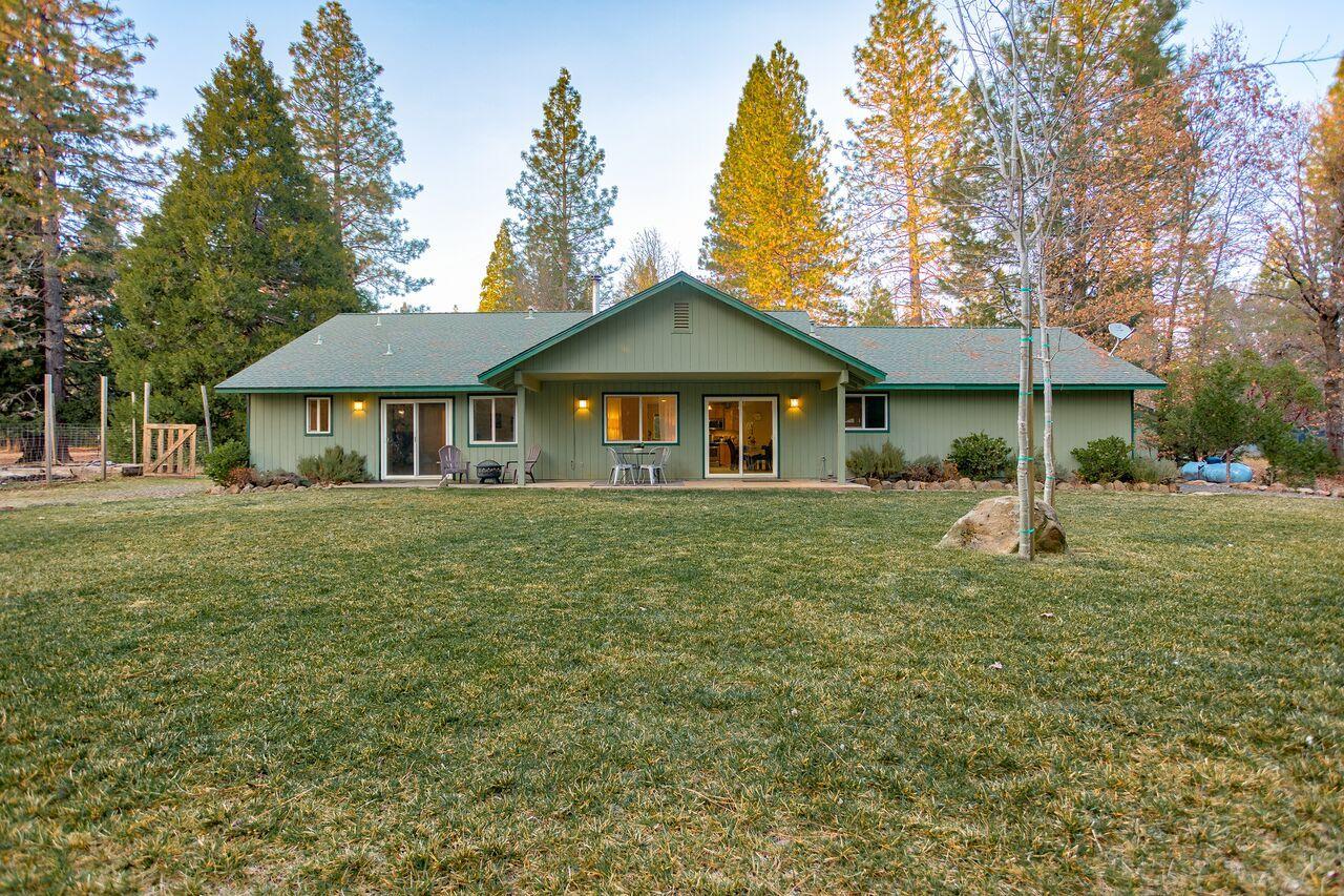 30057 Rl Smith Logging Road Oak Run, CA 96069 - Photo 4 of 58 a front view of a house with a yard