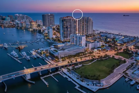an aerial view of a house with outdoor space