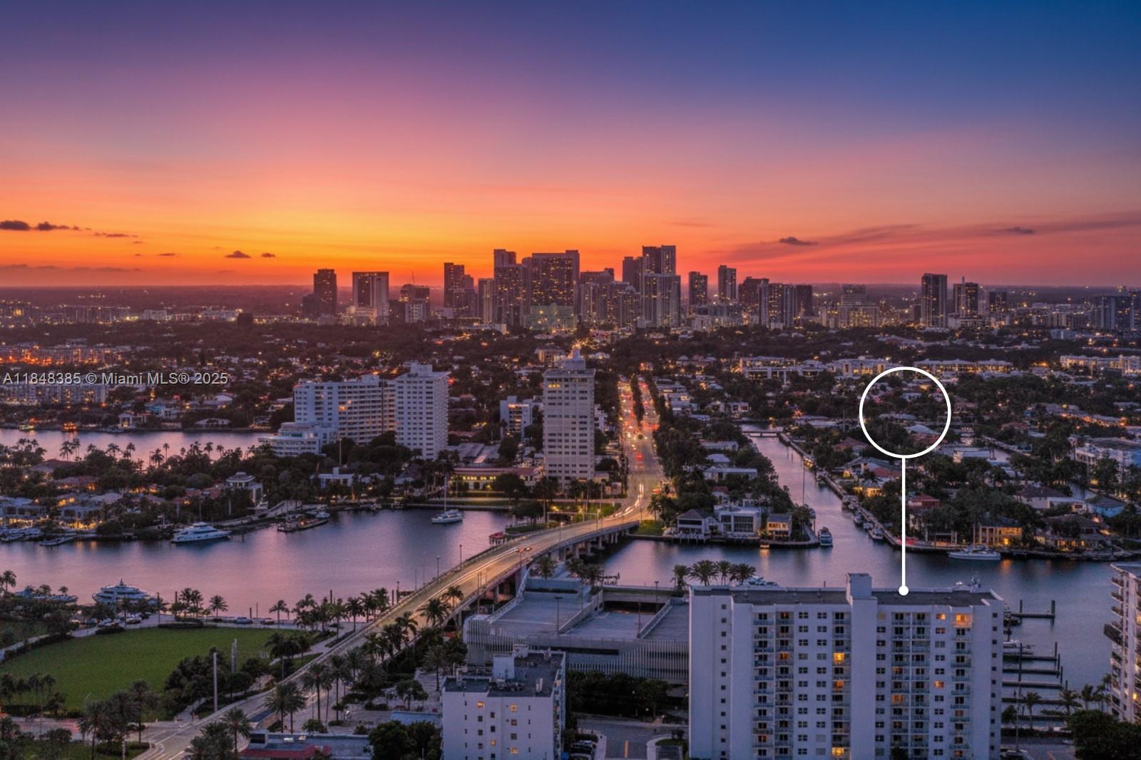 200 South Birch Road, Unit 201 Fort Lauderdale, FL 33316 - Photo 2 of 28 a view of a lake with a city