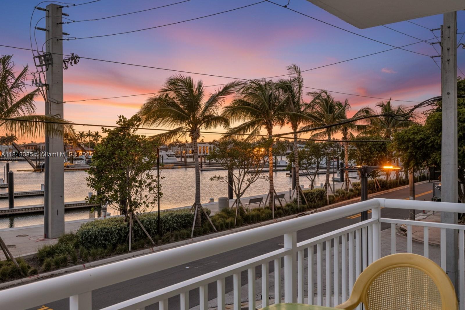 200 South Birch Road, Unit 201 Fort Lauderdale, FL 33316 - Photo 3 of 28 a view of balcony with lamp and tree