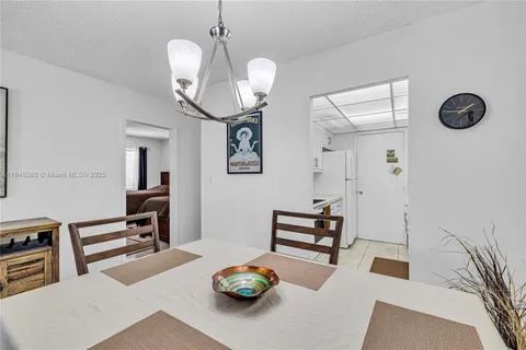 a view of a livingroom with furniture and wooden floor