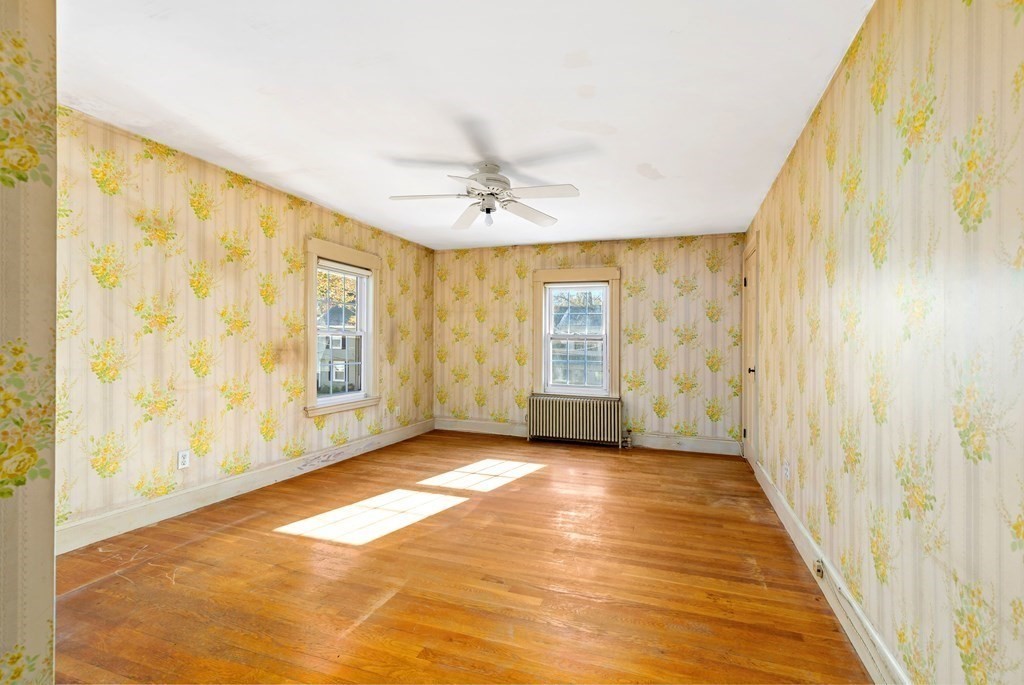 45 Chesterfield Road Milton, MA 02186 - Photo 13 of 23 a view of an empty room with a window