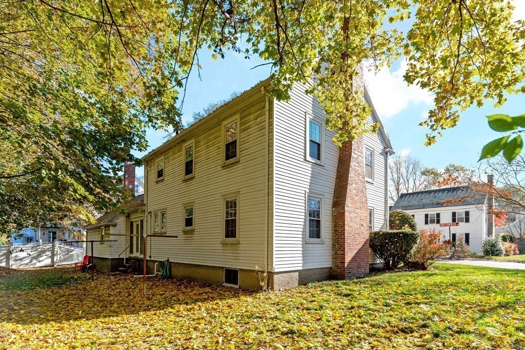 45 Chesterfield Road Milton, MA 02186 - Photo 19 of 23 a view of a house with a yard