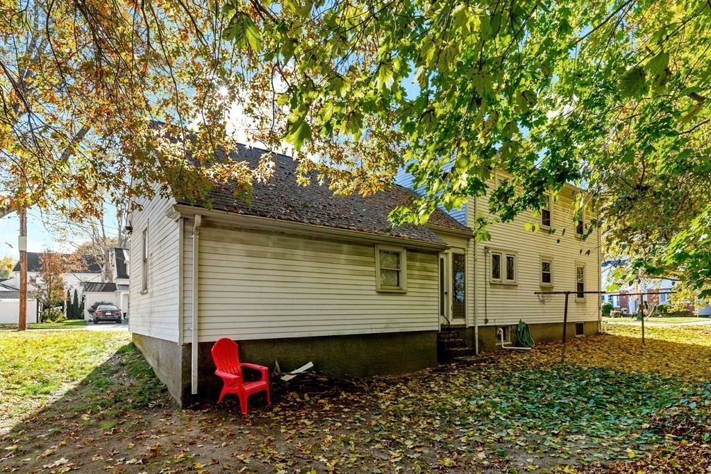 45 Chesterfield Road Milton, MA 02186 - Photo 20 of 23 a view of a house with a backyard