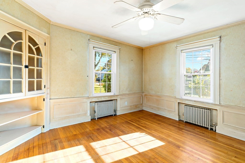 45 Chesterfield Road Milton, MA 02186 - Photo 3 of 23 a view of an empty room with a window