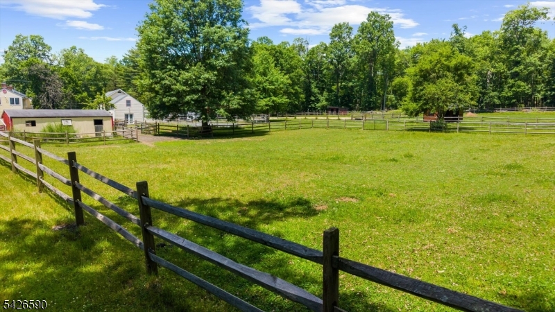 179 Lindbergh Road Hopewell, NJ 08525 - Photo 37 of 46 a view of a yard with an outdoor seating