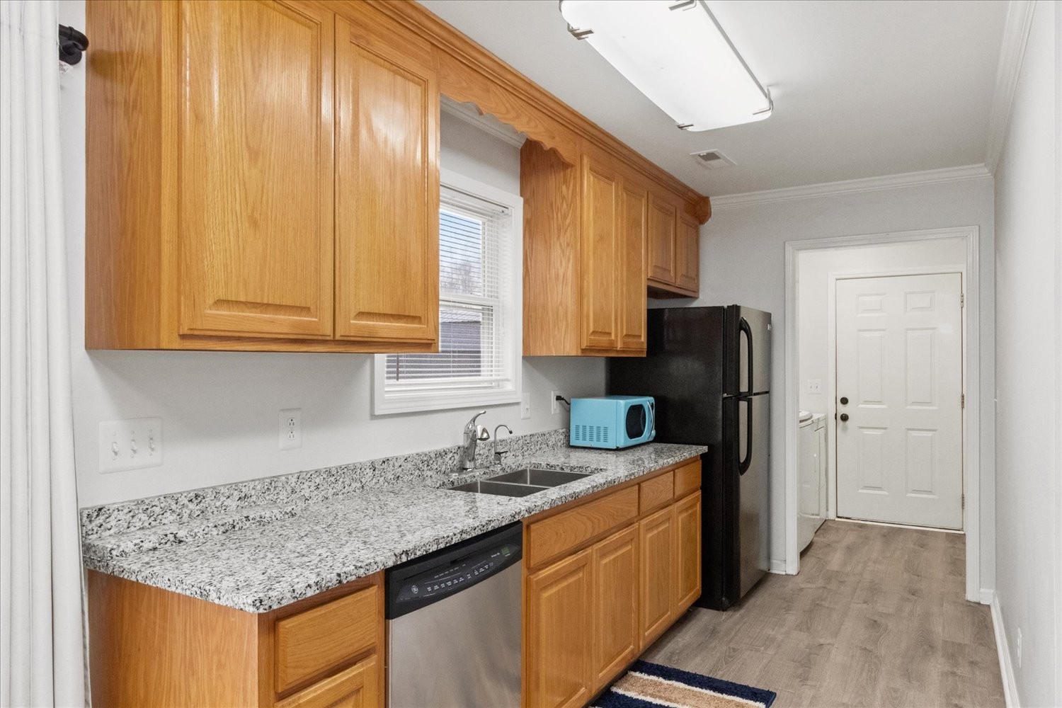351 Rippy Ridge Road Normandy, TN 37360 - Photo 12 of 45 a kitchen with stainless steel appliances granite countertop a sink refrigerator and cabinets