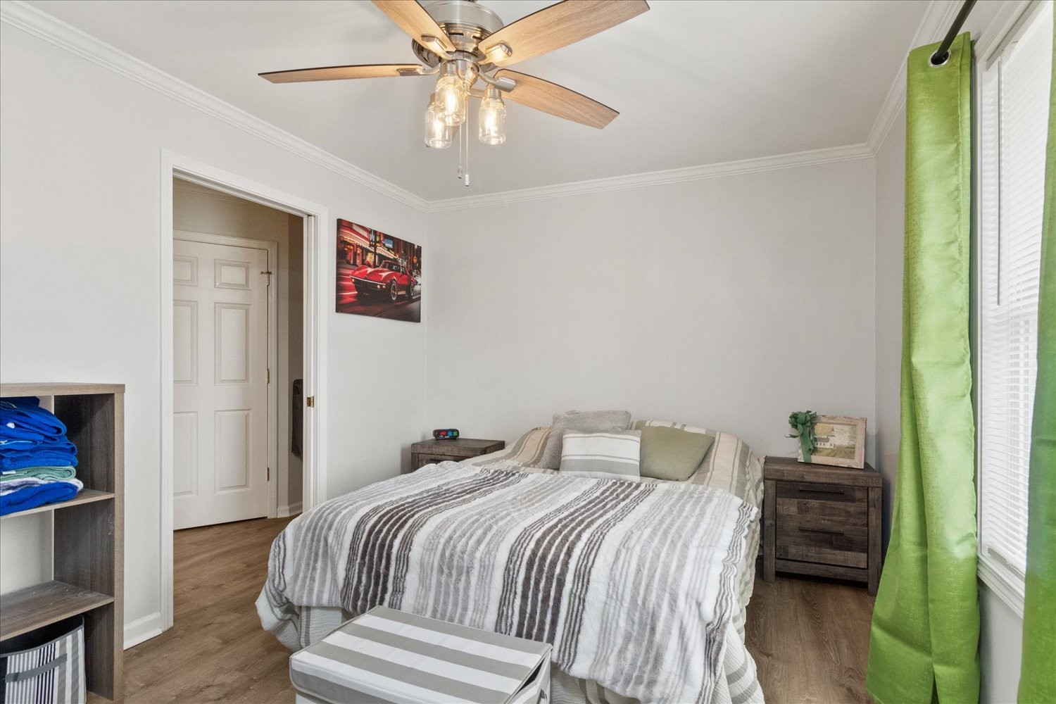 351 Rippy Ridge Road Normandy, TN 37360 - Photo 20 of 45 a bedroom with a bed and a chandelier