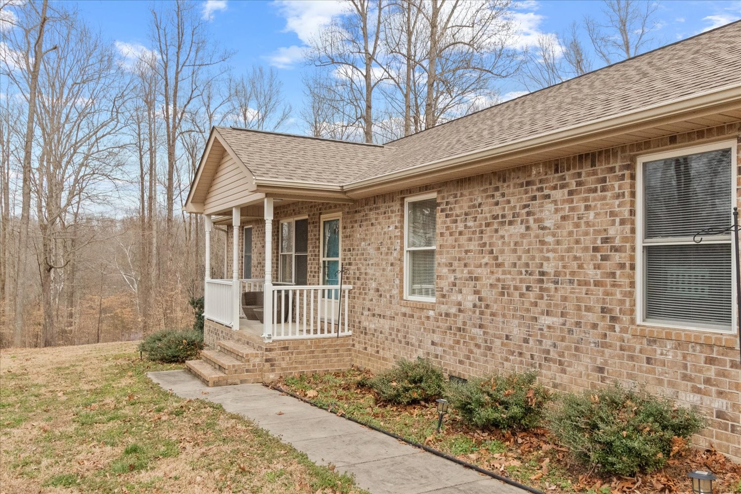 351 Rippy Ridge Road Normandy, TN 37360 - Photo 2 of 45 a front view of a house with garden