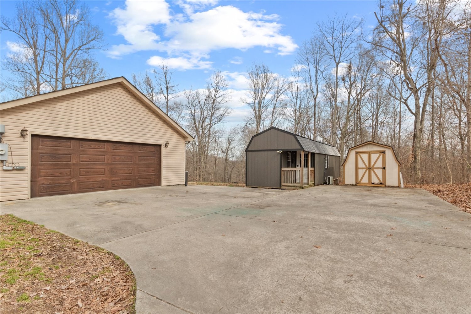 351 Rippy Ridge Road Normandy, TN 37360 - Photo 28 of 45 a front view of a house with yard and garage