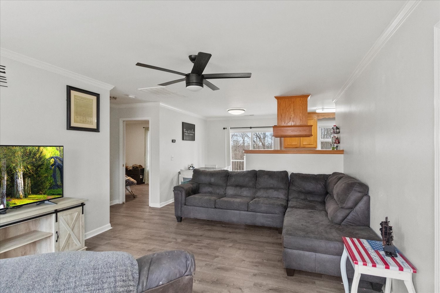 351 Rippy Ridge Road Normandy, TN 37360 - Photo 5 of 45 a living room with furniture a ceiling fan and a rug