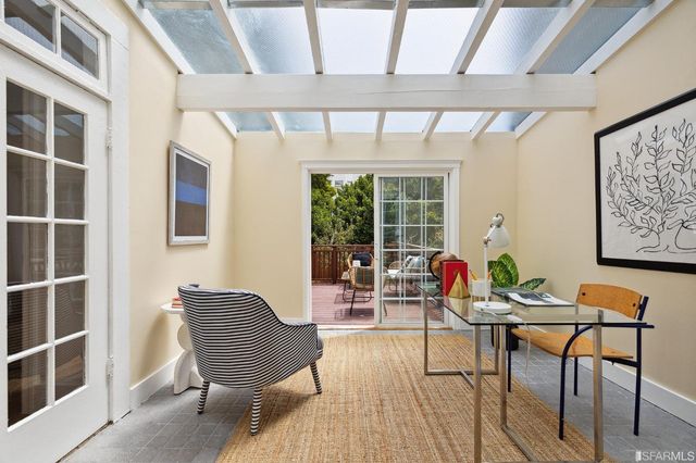 a outdoor living space with furniture and a potted plant