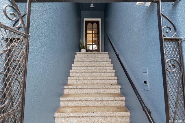 a view of entryway with a front door
