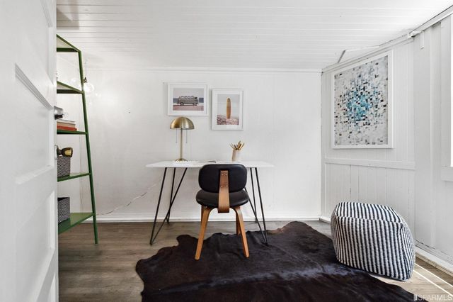 a view of entryway with wooden floor