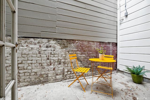 a view of a patio on the roof deck