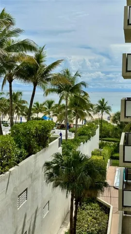 a room with gym equipment and a large window