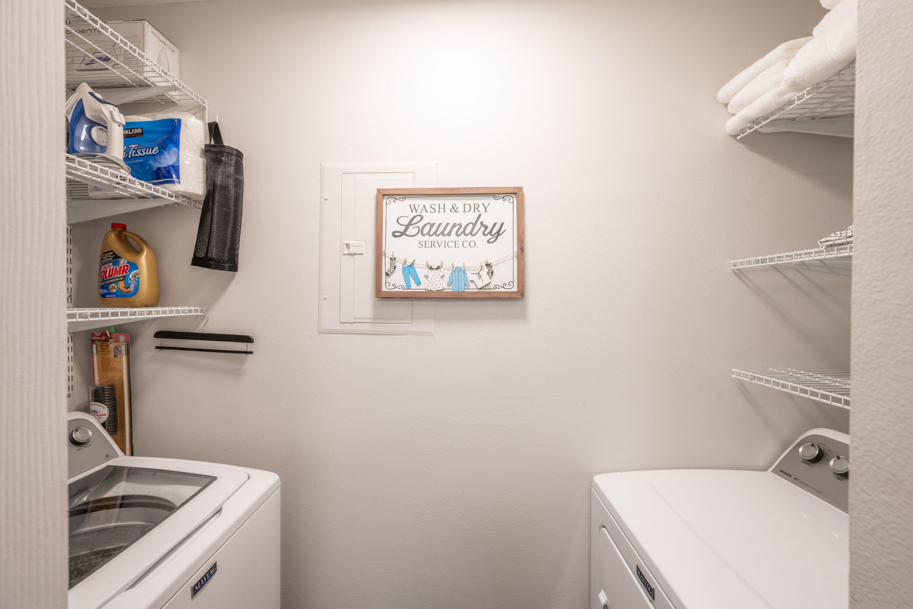 7667 North Wickham Road, Unit 1518 Melbourne, FL 32940 - Photo 15 of 32 a bathroom with a sink a stove and a refrigerator
