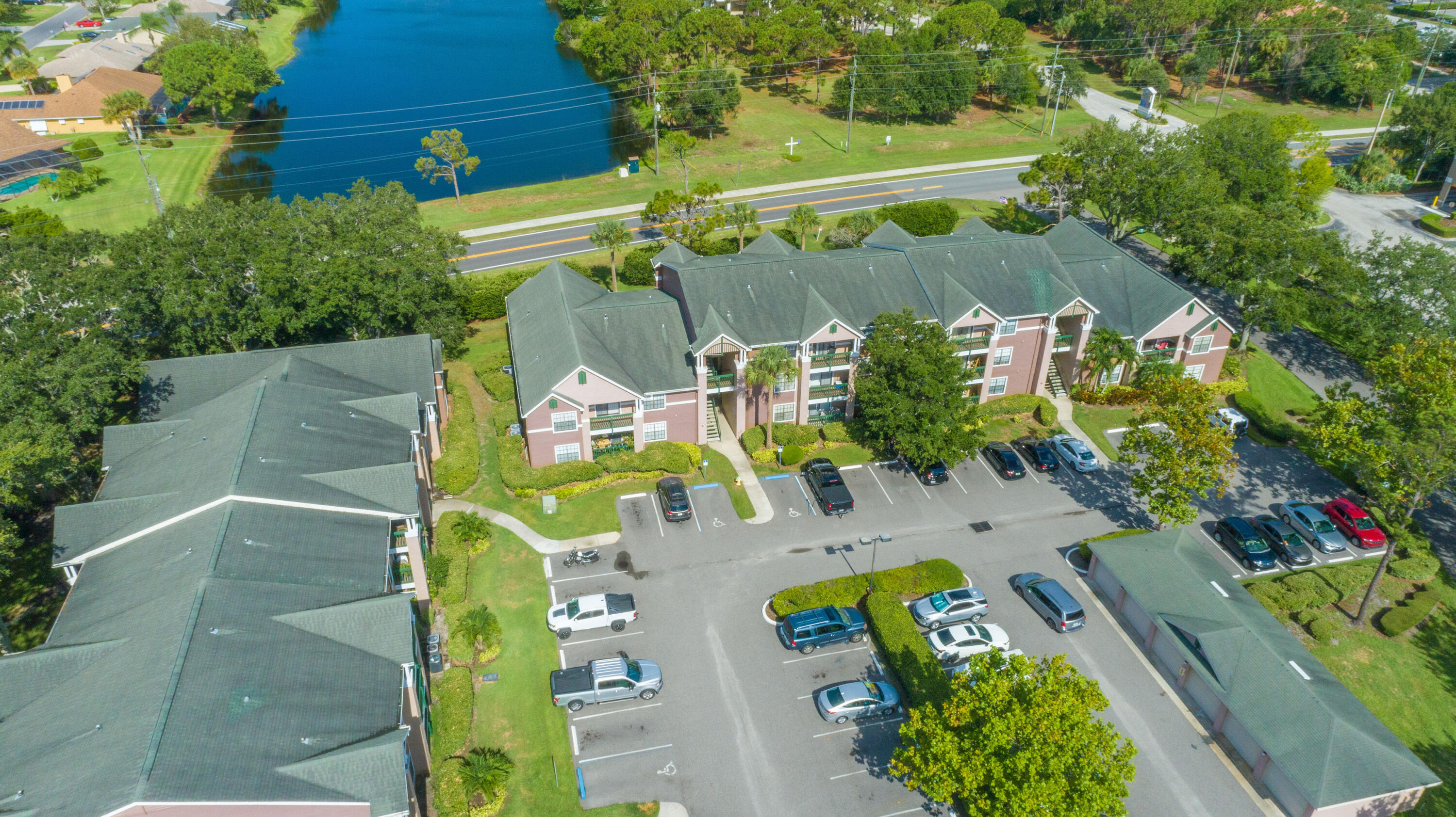 7667 North Wickham Road, Unit 1518 Melbourne, FL 32940 - Photo 19 of 32 an aerial view of houses with outdoor space