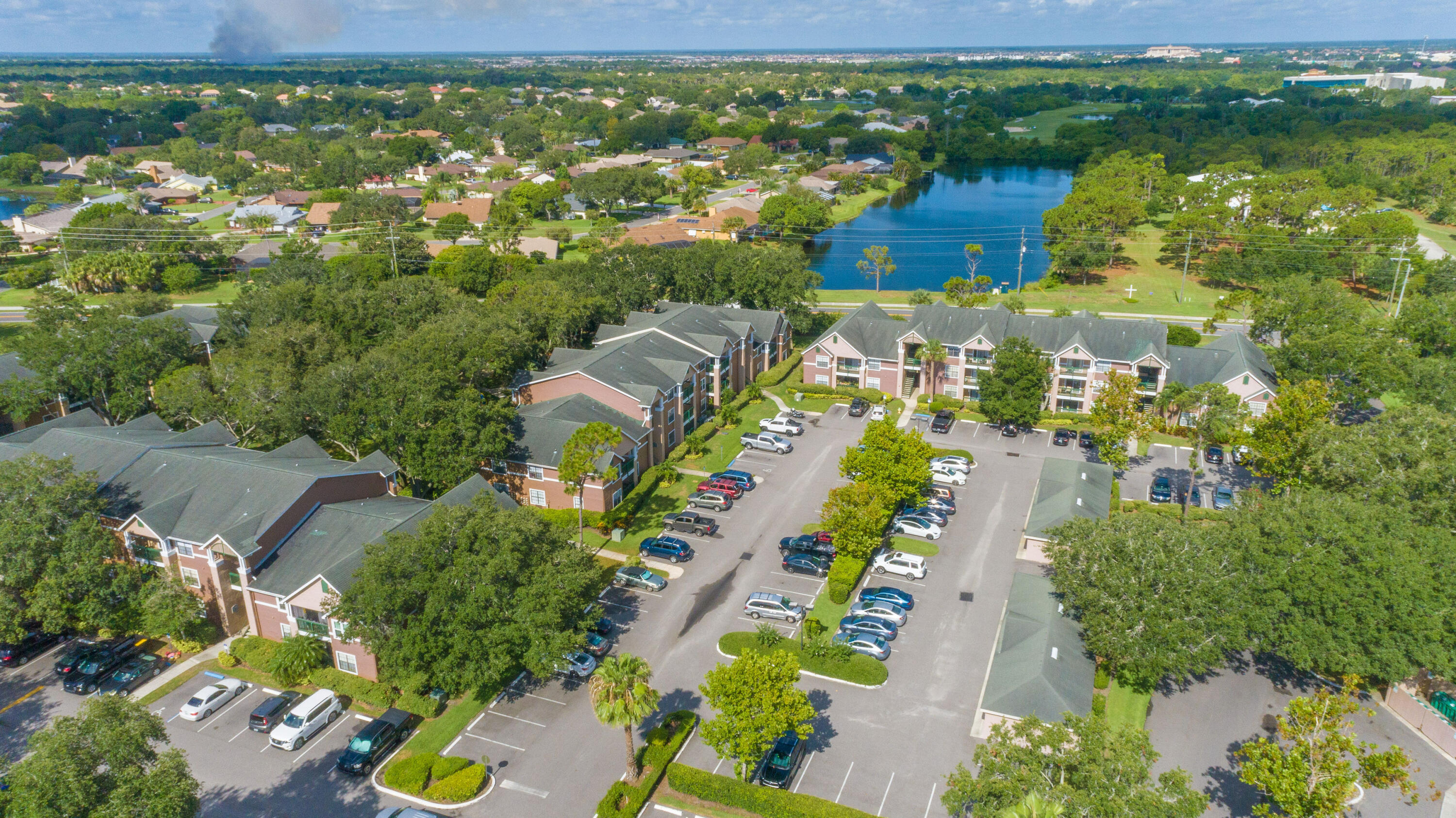7667 North Wickham Road, Unit 1518 Melbourne, FL 32940 - Photo 20 of 32 an aerial view of multiple house