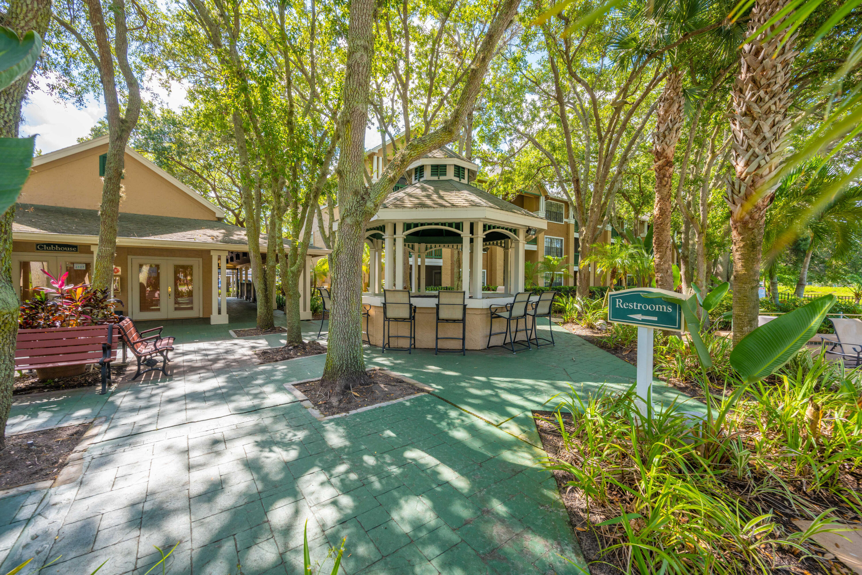 7667 North Wickham Road, Unit 1518 Melbourne, FL 32940 - Photo 26 of 32 a view of a house with a yard