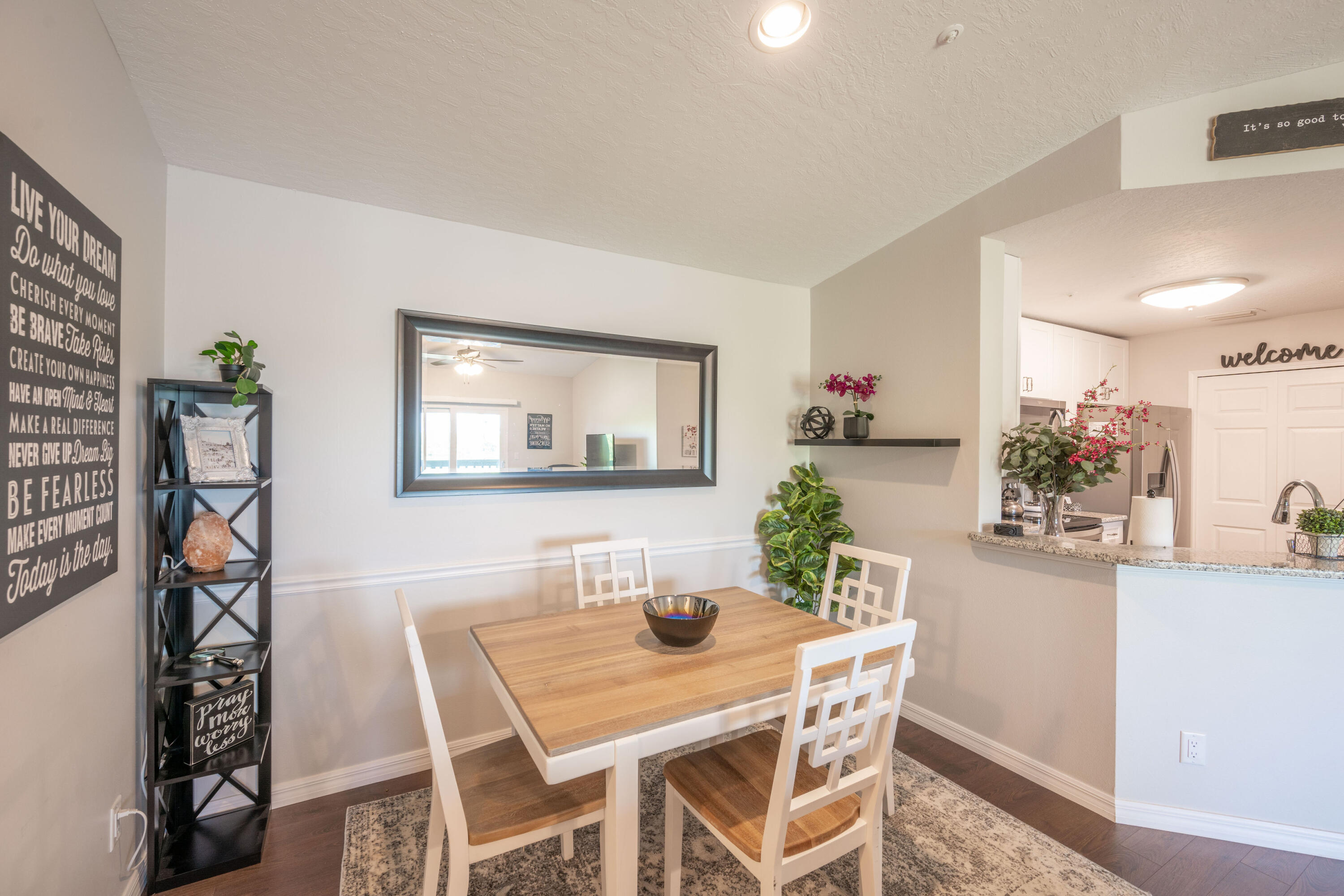 7667 North Wickham Road, Unit 1518 Melbourne, FL 32940 - Photo 6 of 32 a dining room with furniture and window