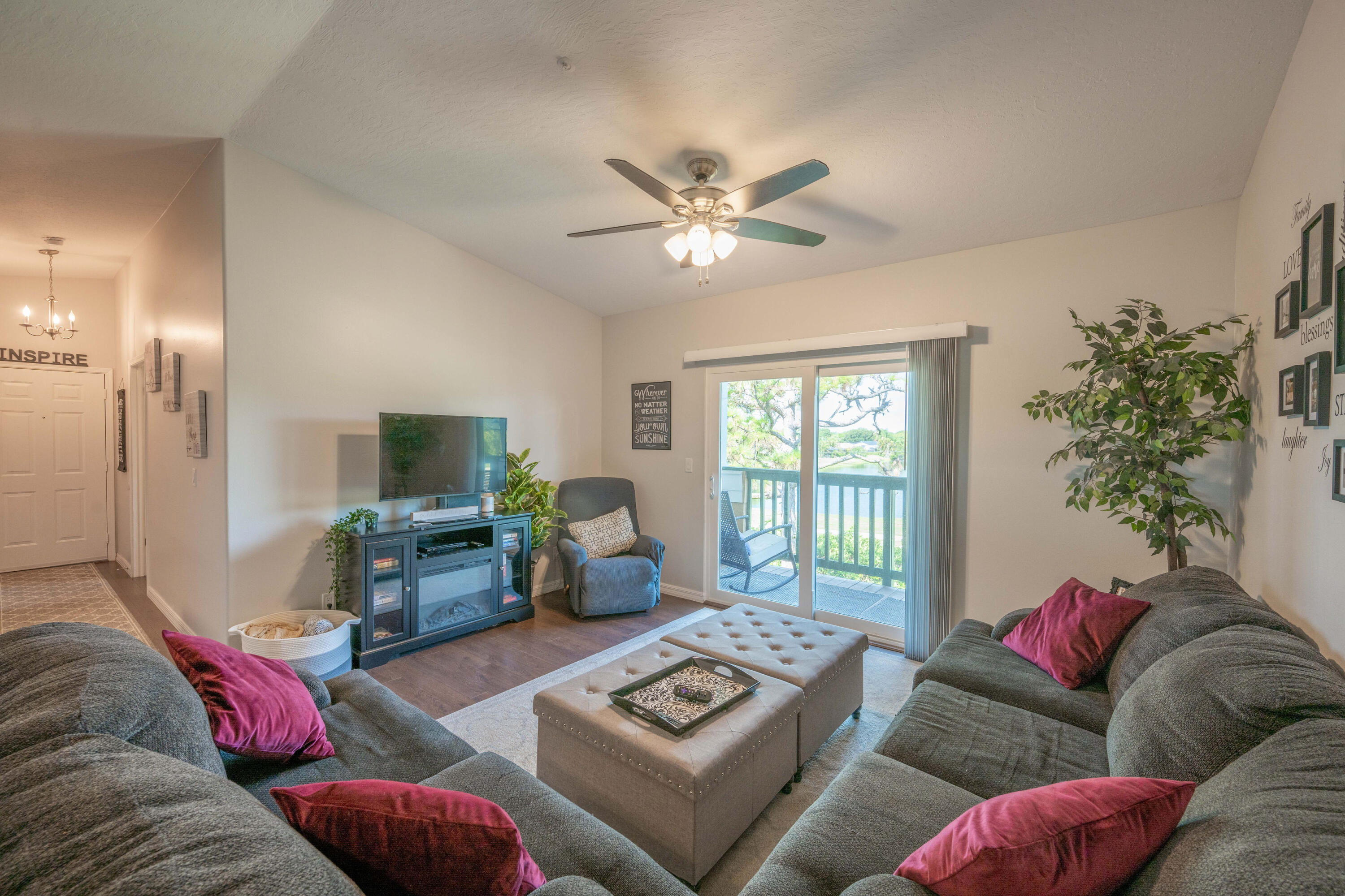 7667 North Wickham Road, Unit 1518 Melbourne, FL 32940 - Photo 7 of 32 a living room with furniture and a window