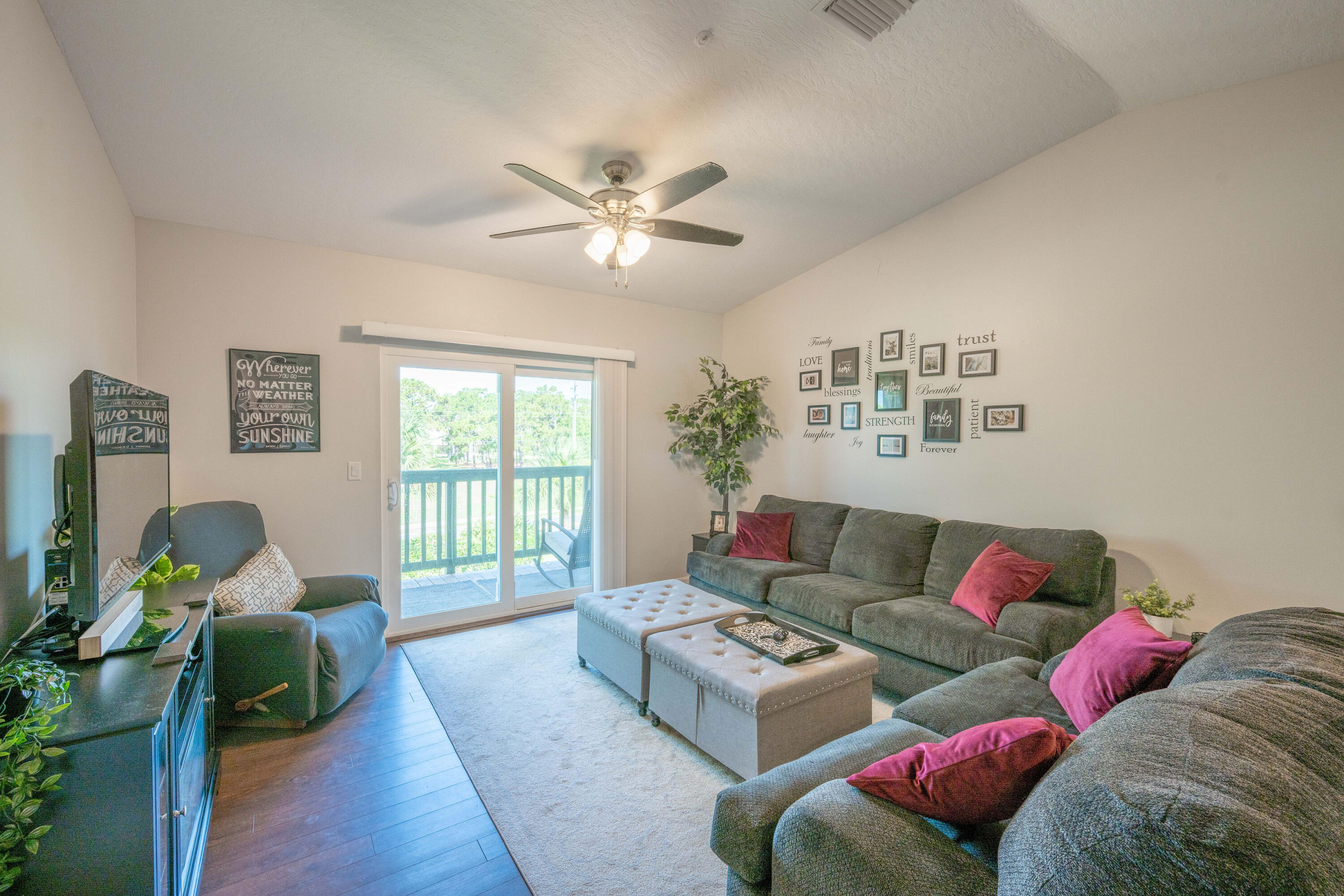 7667 North Wickham Road, Unit 1518 Melbourne, FL 32940 - Photo 8 of 32 a living room with furniture and a window