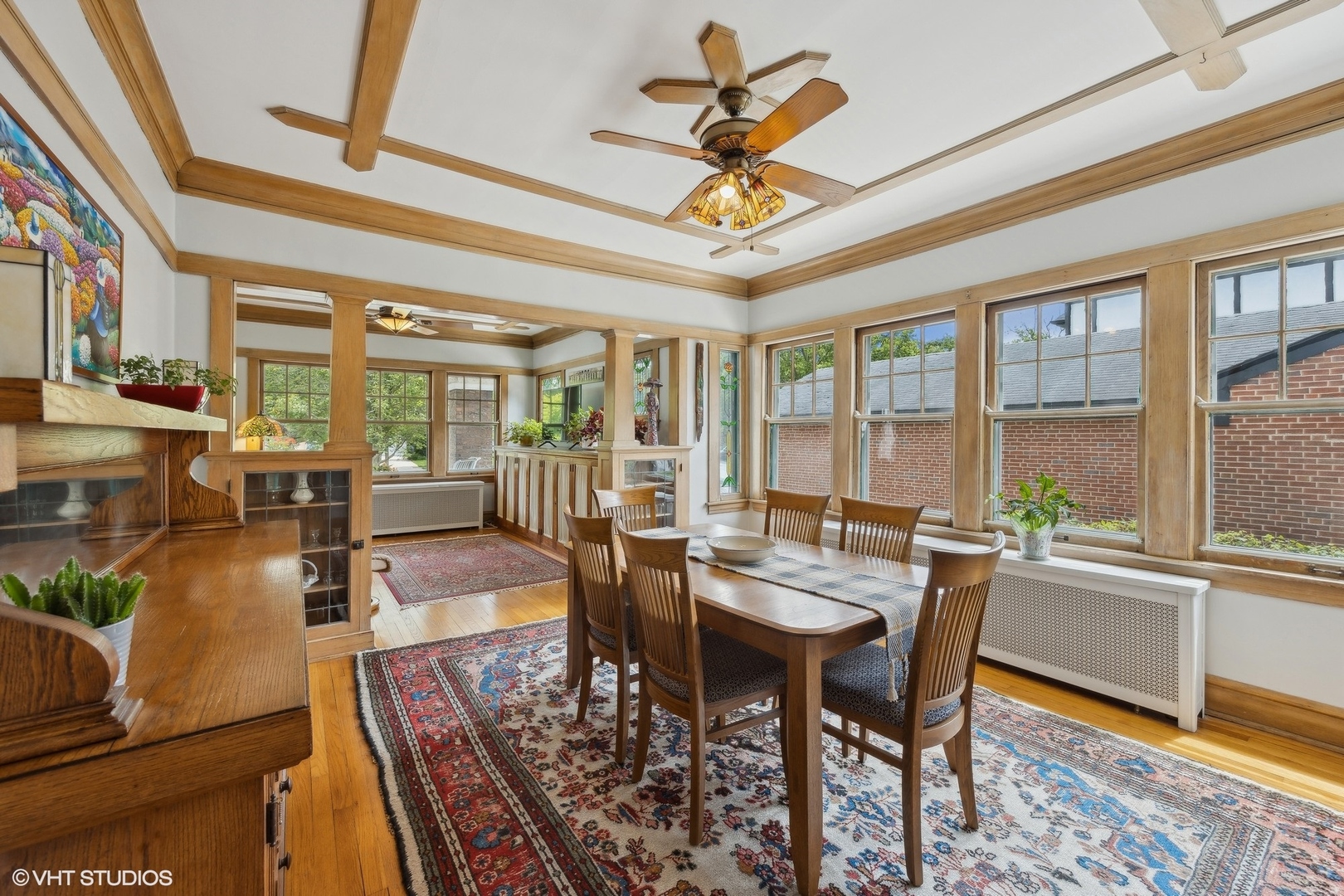 208 Woodside Road Riverside, IL 60546 - Photo 13 of 37 a view of a dining room with furniture window and wooden floor
