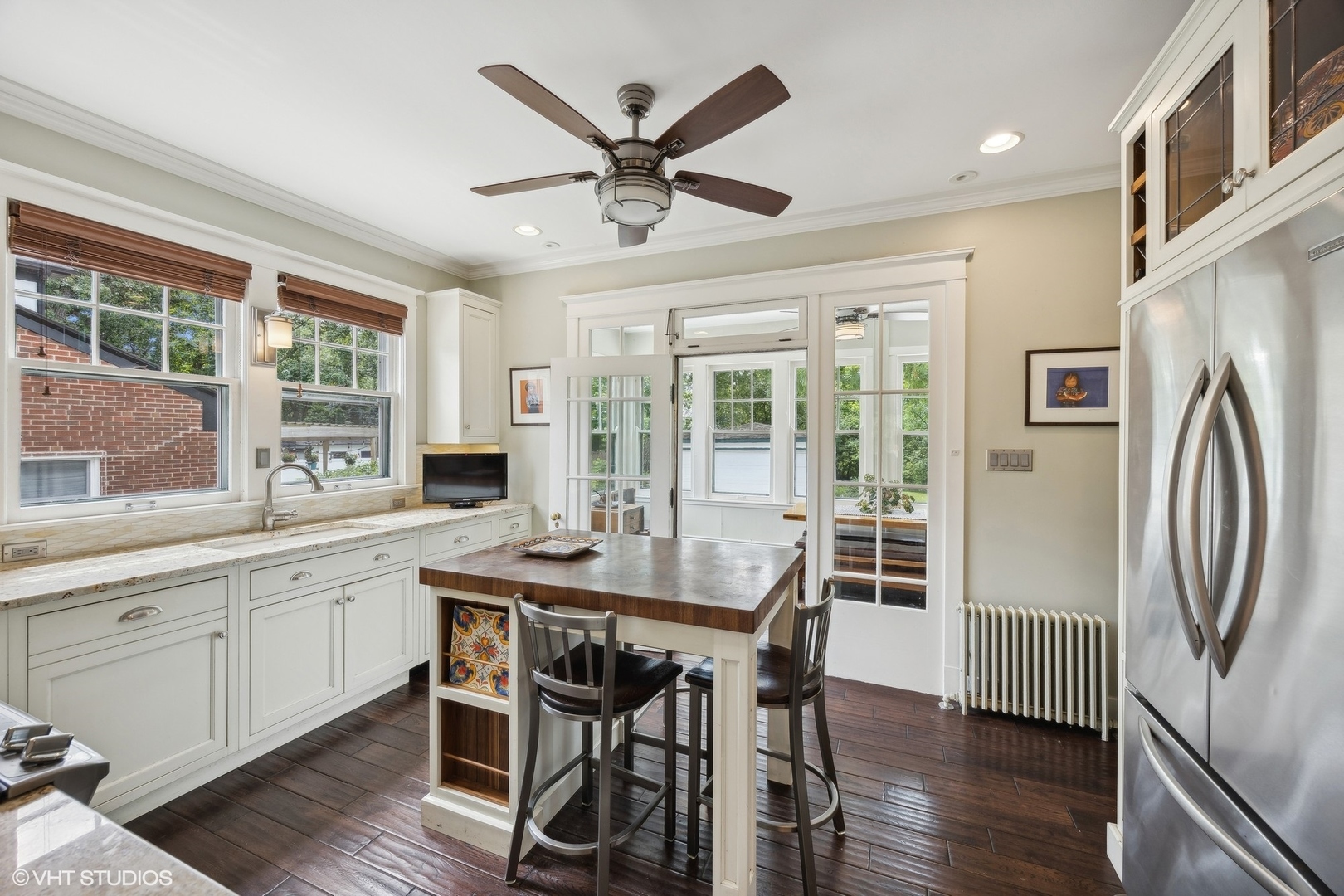 208 Woodside Road Riverside, IL 60546 - Photo 15 of 37 a view of a dining room with furniture window and wooden floor