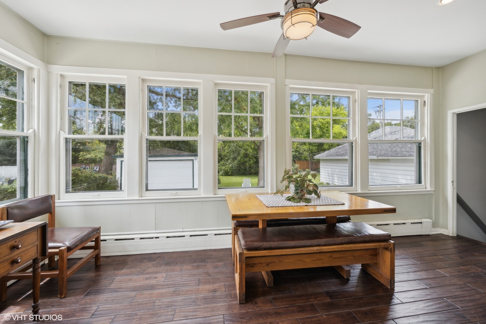 208 Woodside Road Riverside, IL 60546 - Photo 19 of 37 a view of a dining room with furniture window and wooden floor