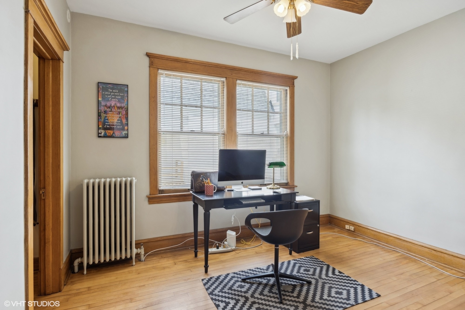 208 Woodside Road Riverside, IL 60546 - Photo 21 of 37 a view of a workspace with furniture and a window