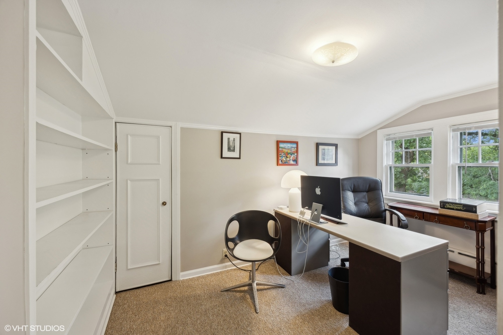 208 Woodside Road Riverside, IL 60546 - Photo 27 of 37 a view of a workspace with furniture and a window