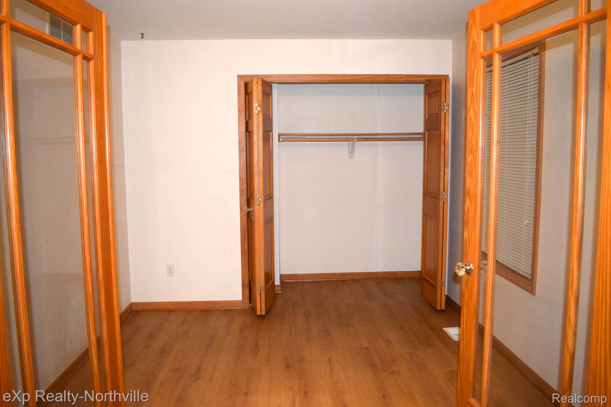 5995 Seymour Road Jackson, MI 49201 - Photo 16 of 43 Main-floor laundry with tub and lots of closets