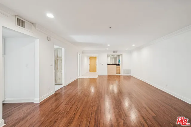 a kitchen with stainless steel appliances granite countertop a sink and a stove