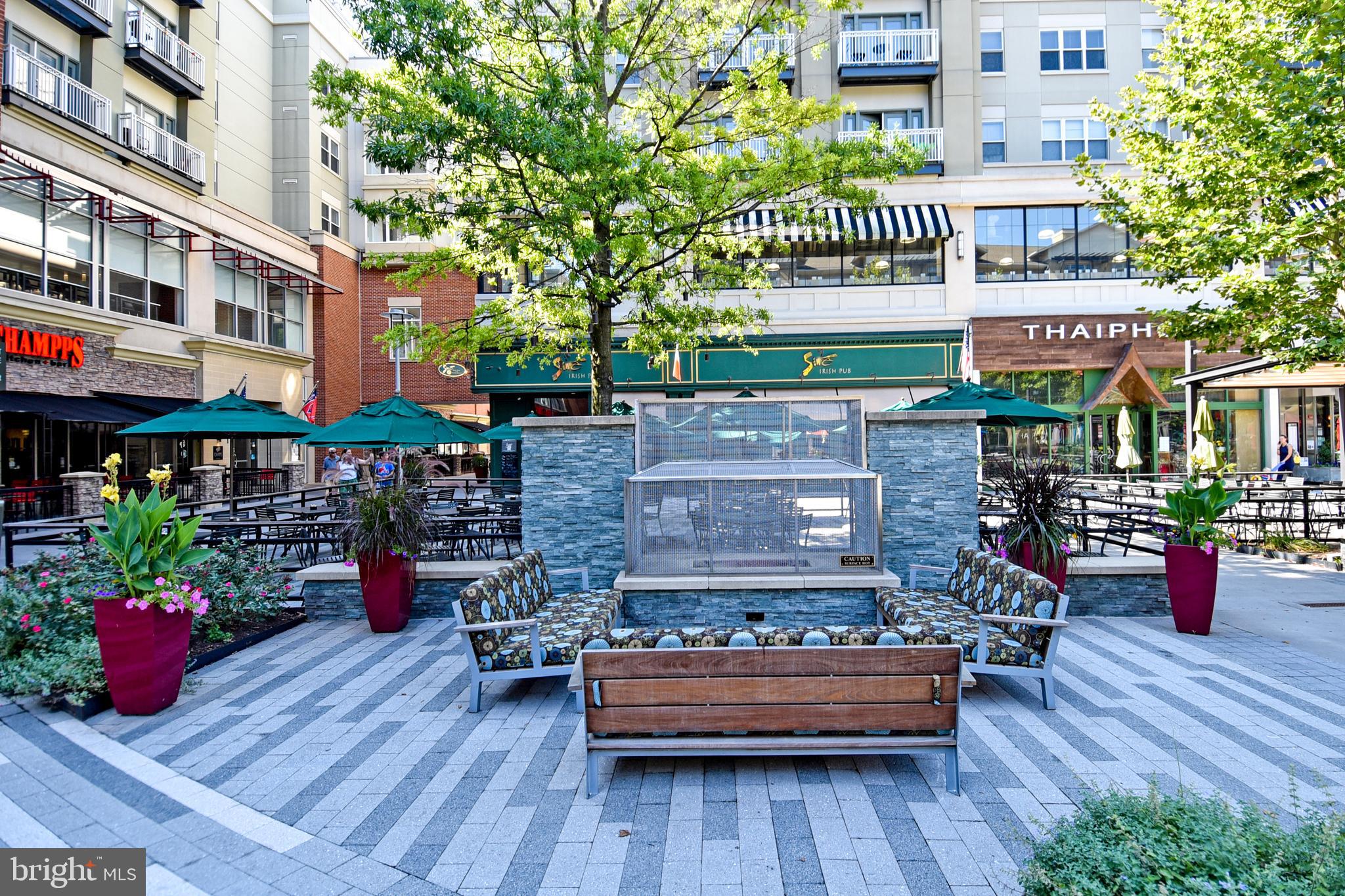 1301 South Arlington Ridge Road, Unit 110 Arlington, VA 22202 - Photo 35 of 45 a front view of a building with outdoor seating
